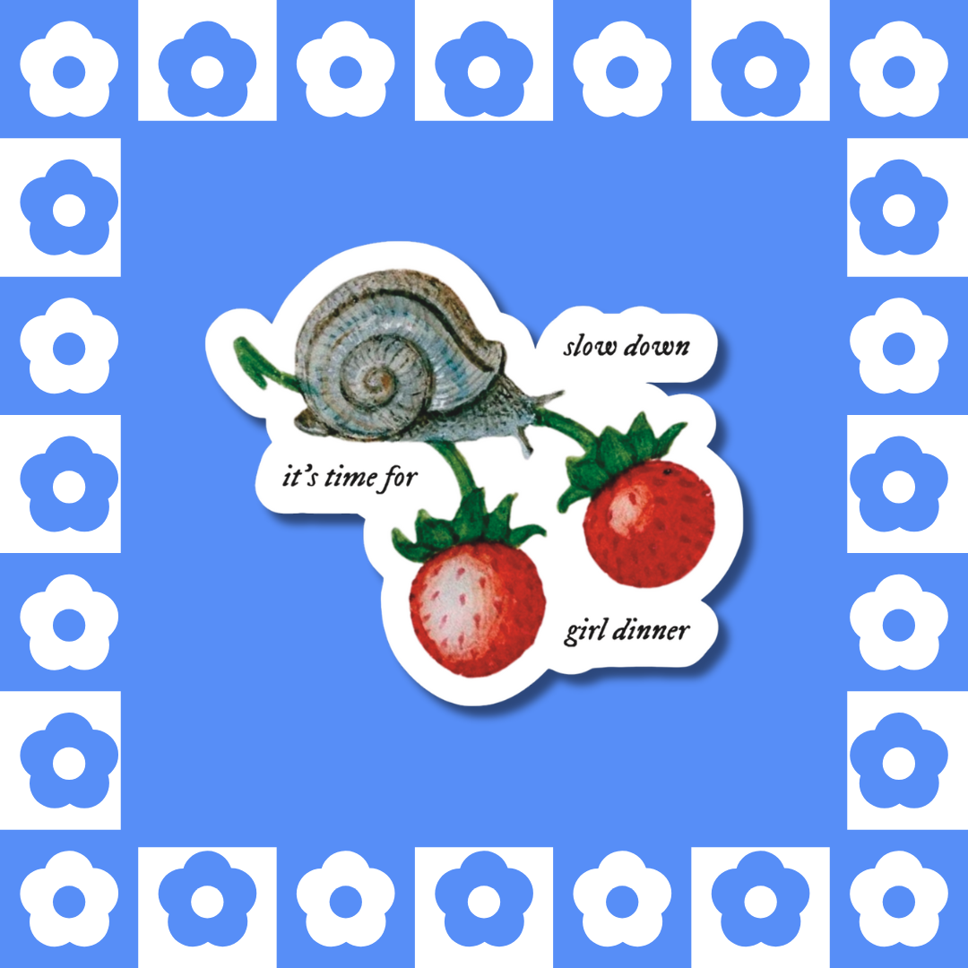 Matte vinyl sticker with the text ‘Slow Down, It’s Time for Girl Dinner’ in medieval manuscript-inspired font